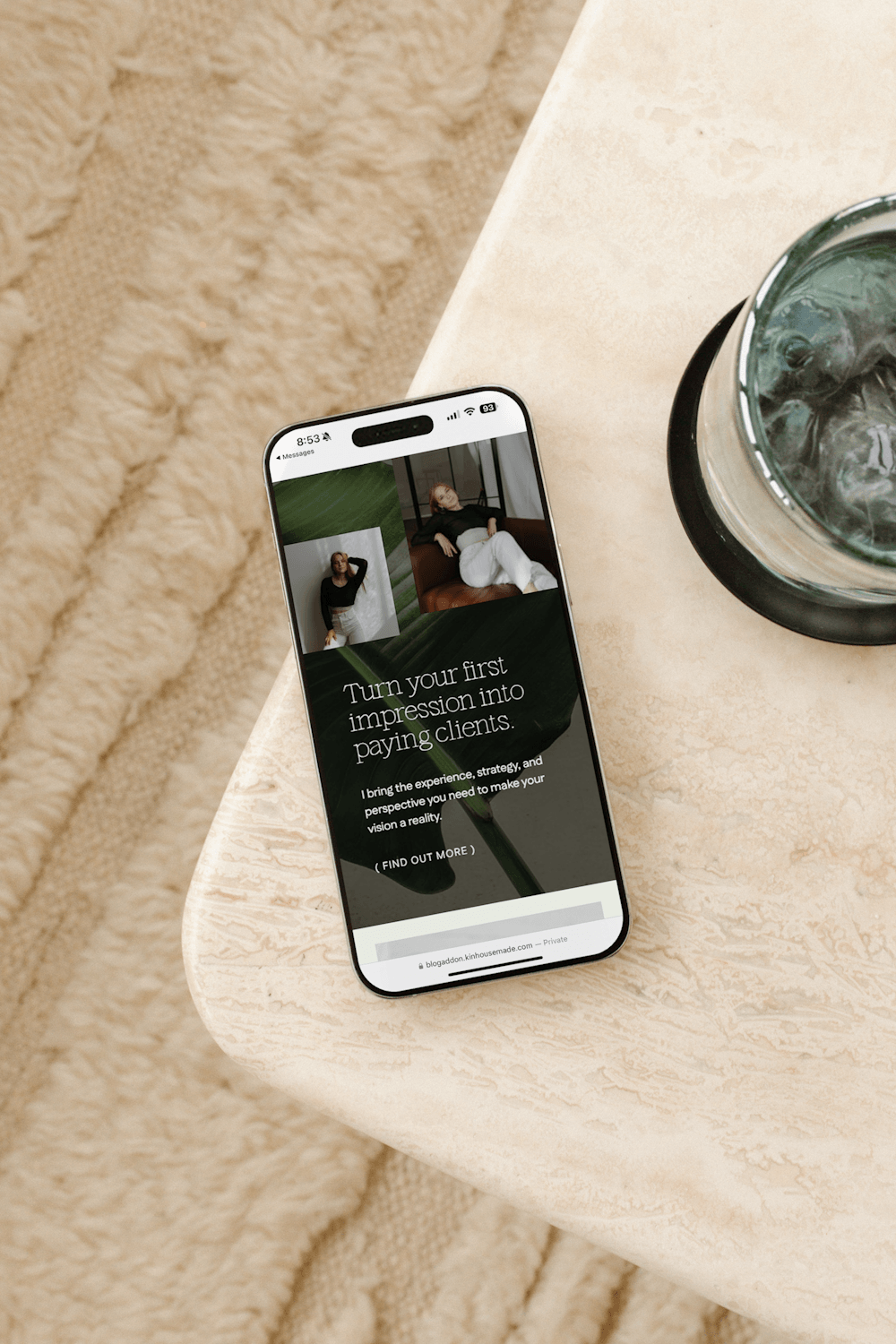 A photo of an iPhone showing a modern Showit Website Template with responsive design